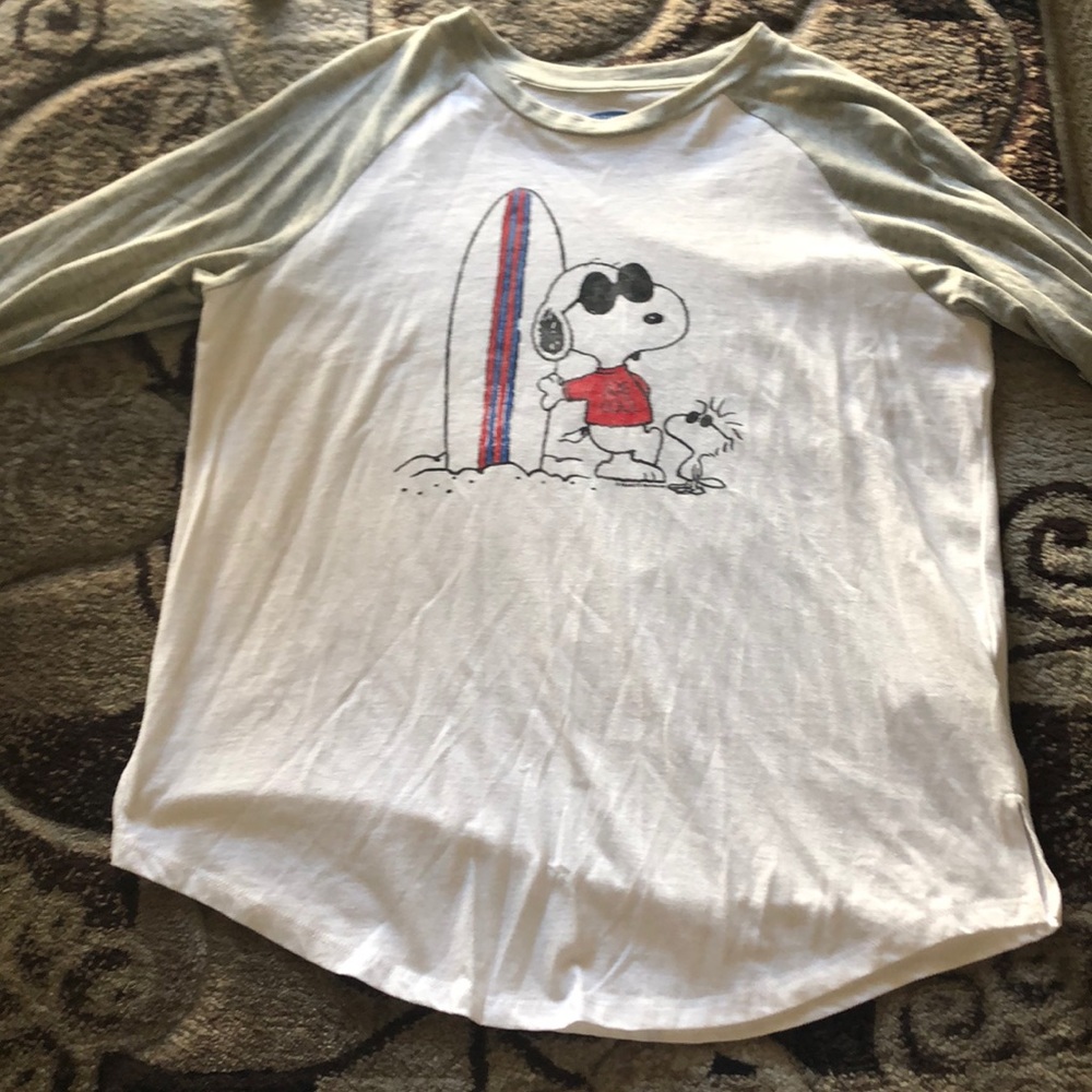 A cute shirt with a cute picture on it.